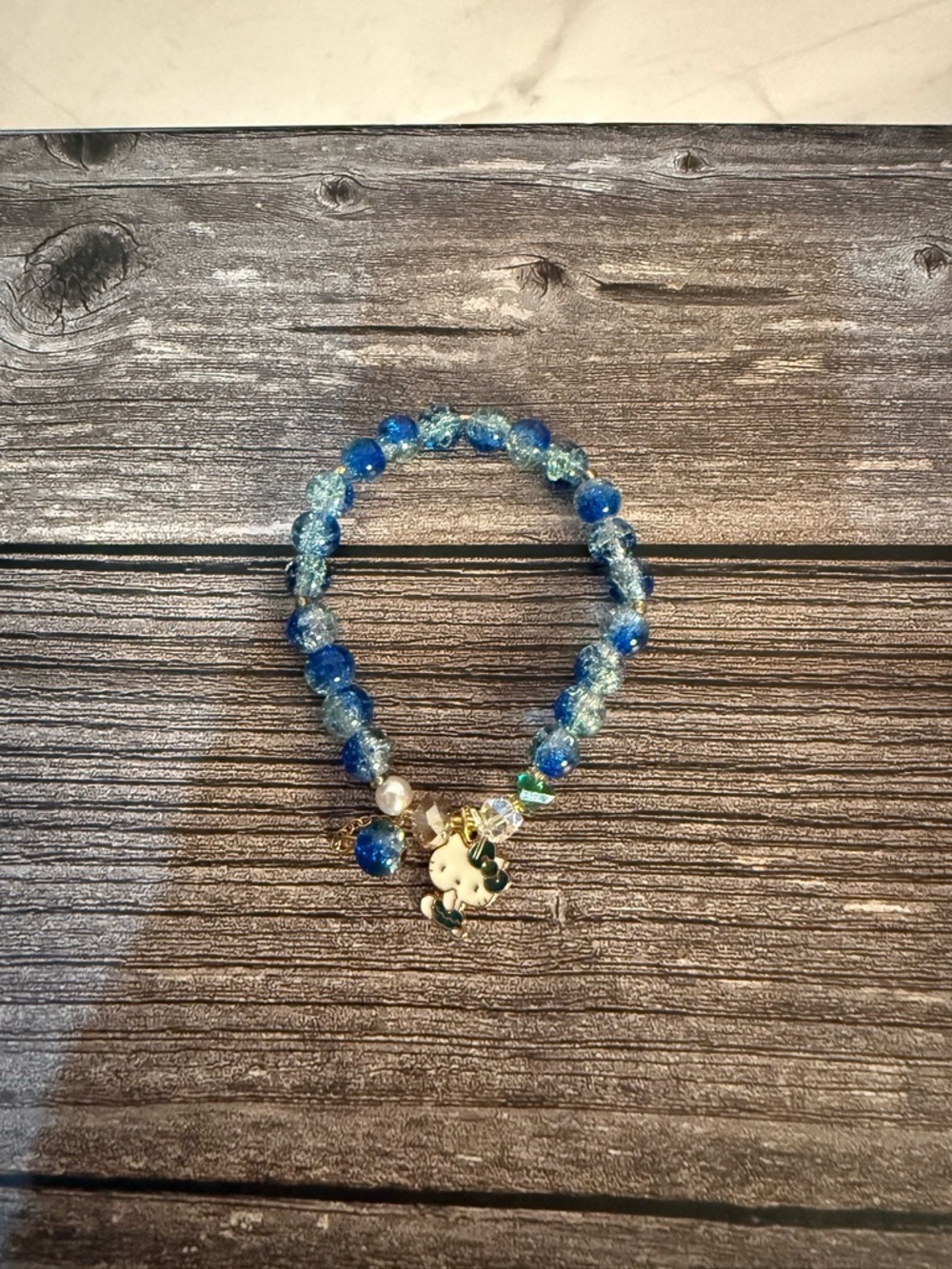 NWOT Hello Kitty blue beaded stretch bracelet